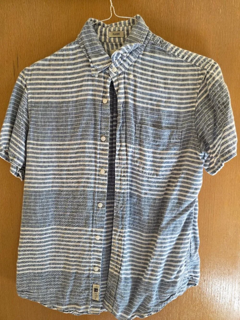 Small blue short sleeve button down shirt